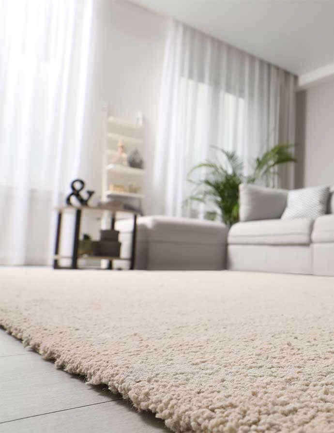 Quel budget prévoir pour la pose d'une moquette ?